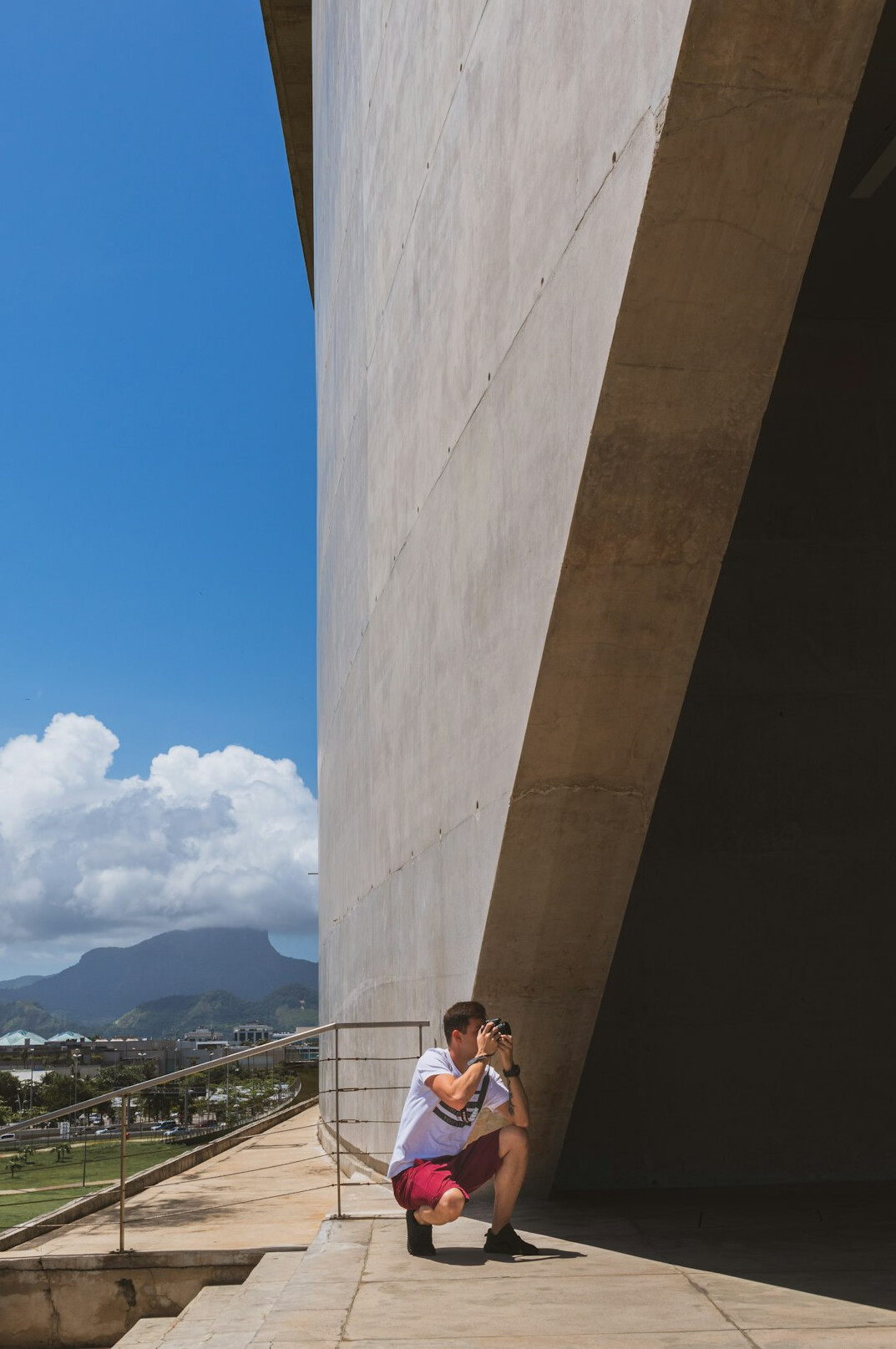 Two Brazilian people in a supportive conversation outdoors